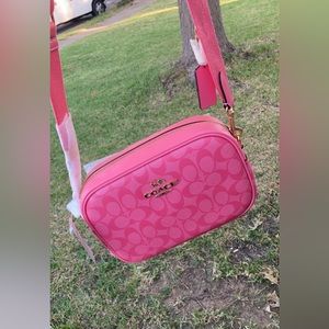 Coach signature camera bag in pink